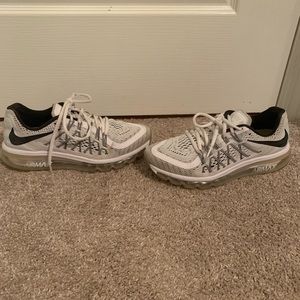 white and gray Nike air Max running shoes